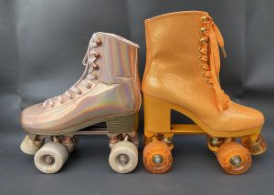 A rose gold skate and an orange skate