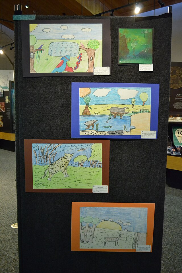 Photos of a student Art competition featuring 4 photos of student art