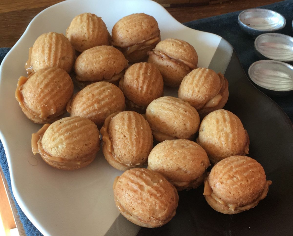 Small cookies in the shape of walnuts with a dulce de leche filling