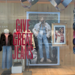 Front window display of American Eagle showcasing their new merchandise and styled fall outfits