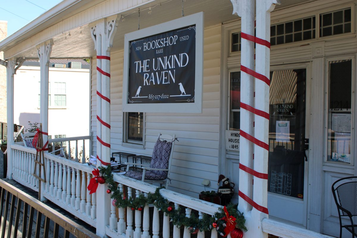 decorated storefront for "The Unkind Raven"