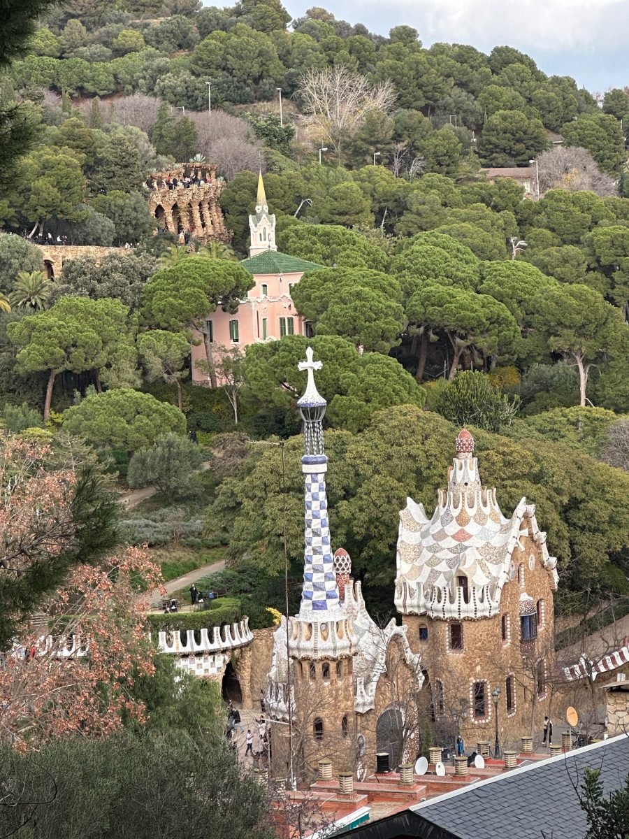 | Multiple tall, stylized buildings peeking out from surrounding foliage