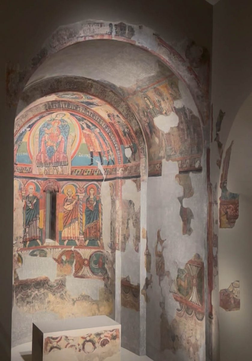 | Walls covered in colorful ancient murals depicting various scenes