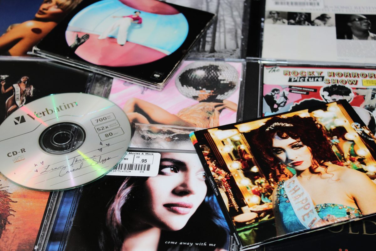 Assortment of different CDs with different genres represented