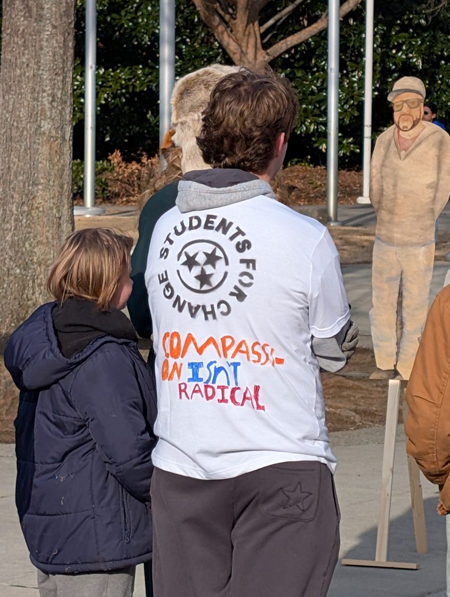 A Tennessee Student For Change: dawning a shirt with “Compassion” written in VOLS orange.