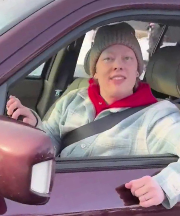 Renee Good sitting in her car.