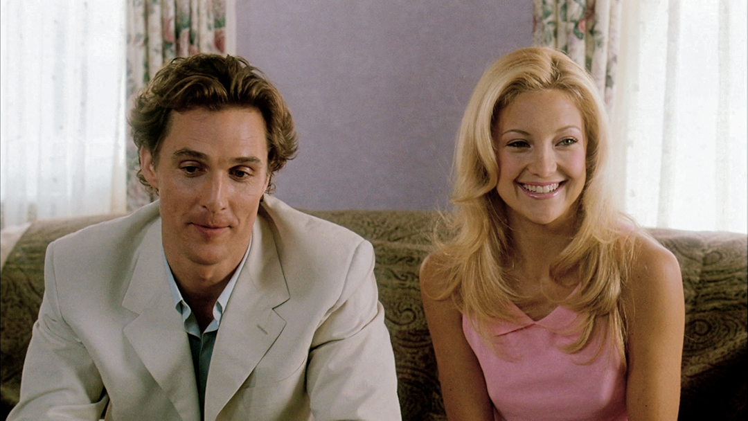 Andie and Ben sit on a couch and participate in couples therapy.