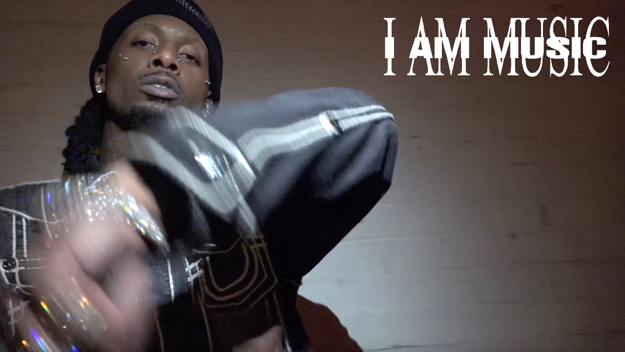 Cover for "Like Weezy" YouTube music video with "I AM MUSIC"