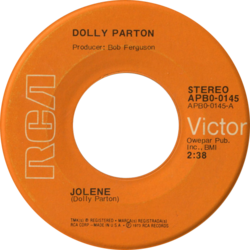 Orange album with the words Dolly Parton and Jolene on it.