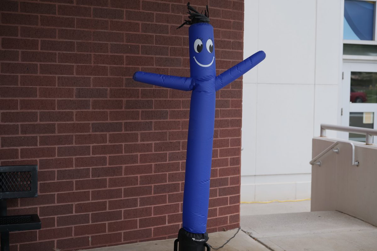 blue wavy arm man