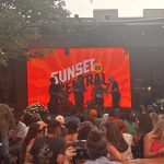 "Sunset on Central" projected behind band